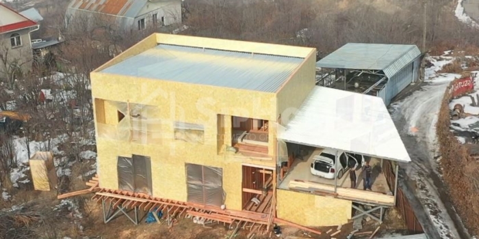 Строительство каркасного дома на склоне горы в Ремизовке, 216 кв.м